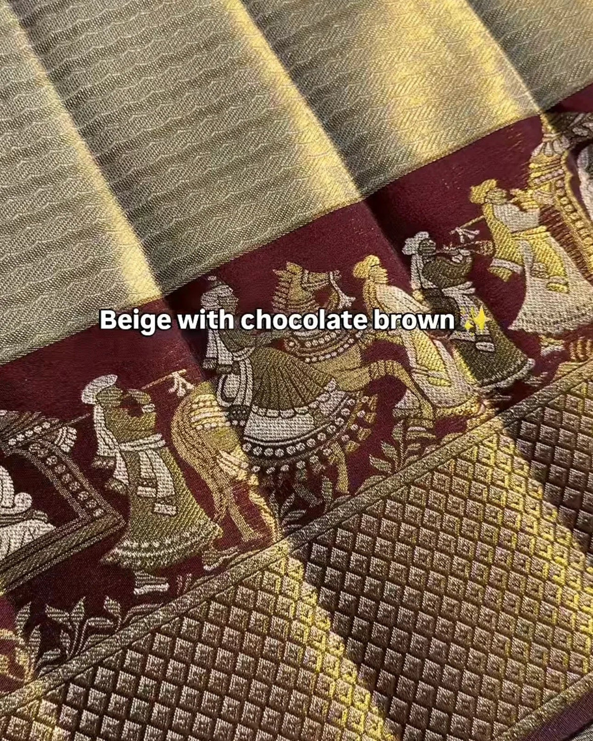 Textile with beige and chocolate brown patterns and designs.